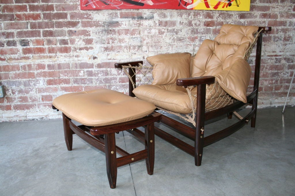 A lounge chair and ottoman, model 