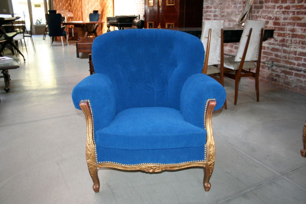 Pair of 1920's French Louis XV armchairs upholstered with blue velvet, gold leaf finish