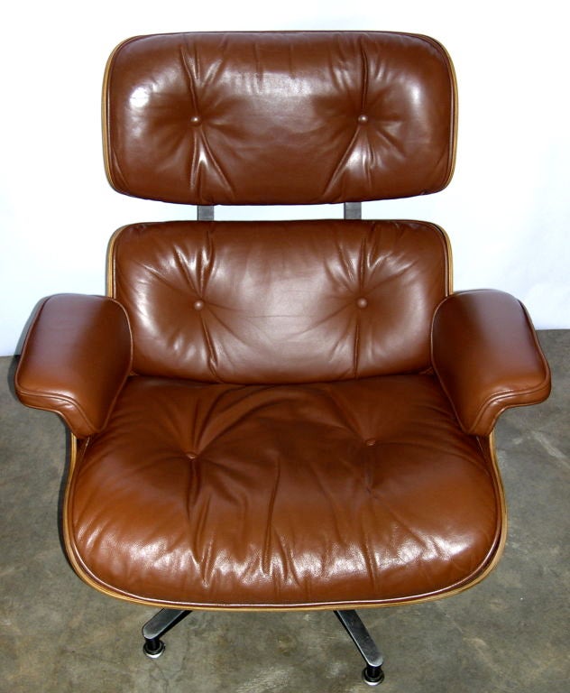 Raro esemplare originale di Eames 670 e 671 in legno di palissandro e pelle di Siena bruciata 1