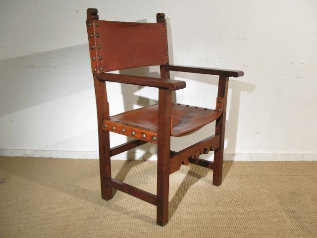 A Set of 8 Spanish Colonial Leather Dining Chairs