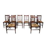 A Set of EIght Mahogany Aesthetic Movement Dining Chairs