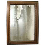 A Spanish Walnut Mirror with Brass Nail Head Decoration
