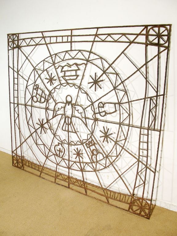 A Unique Wrought Iron Screen With Naive Symbols