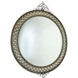 A 1950's Round, Patinated Metal Mirror With Calligraphic Edge