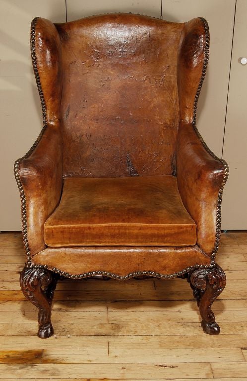 A Large Regency Leather Armchair With Nailheads