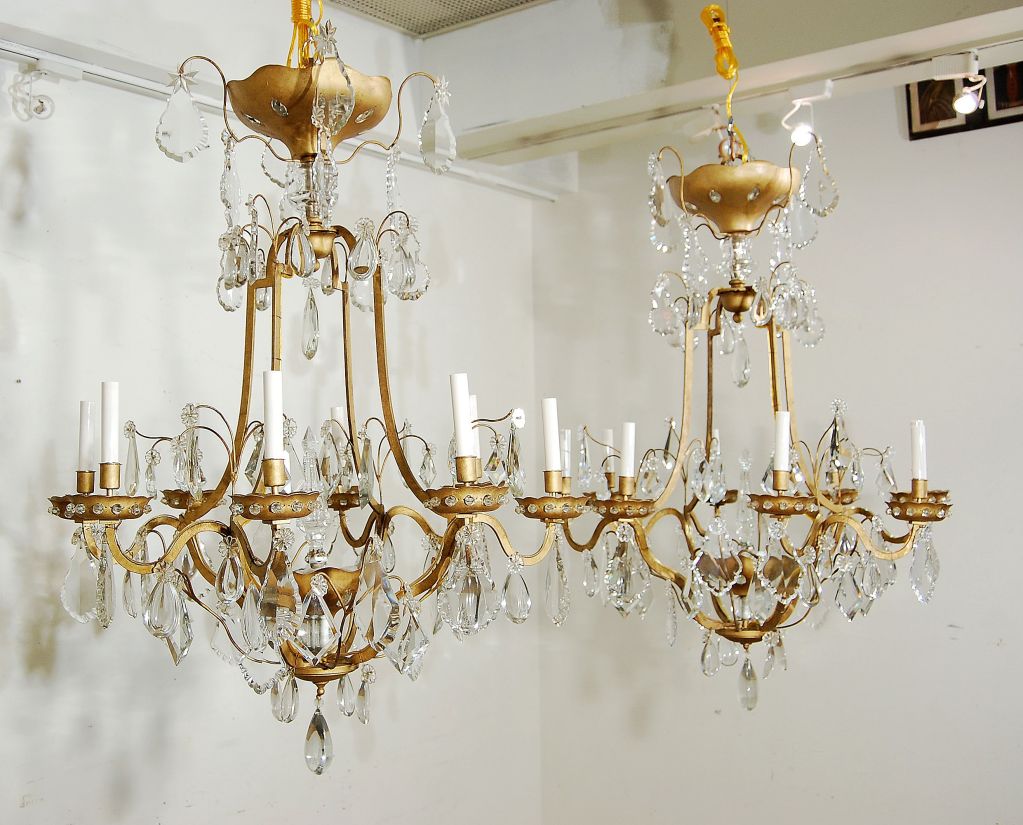 Pair of Louis XIV Style Gilded Metal and Crystal Chandeliers