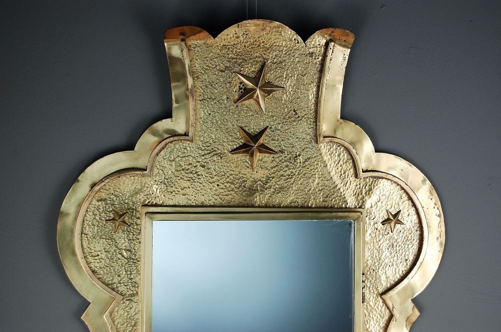 An Amusing French Repousse Mirror