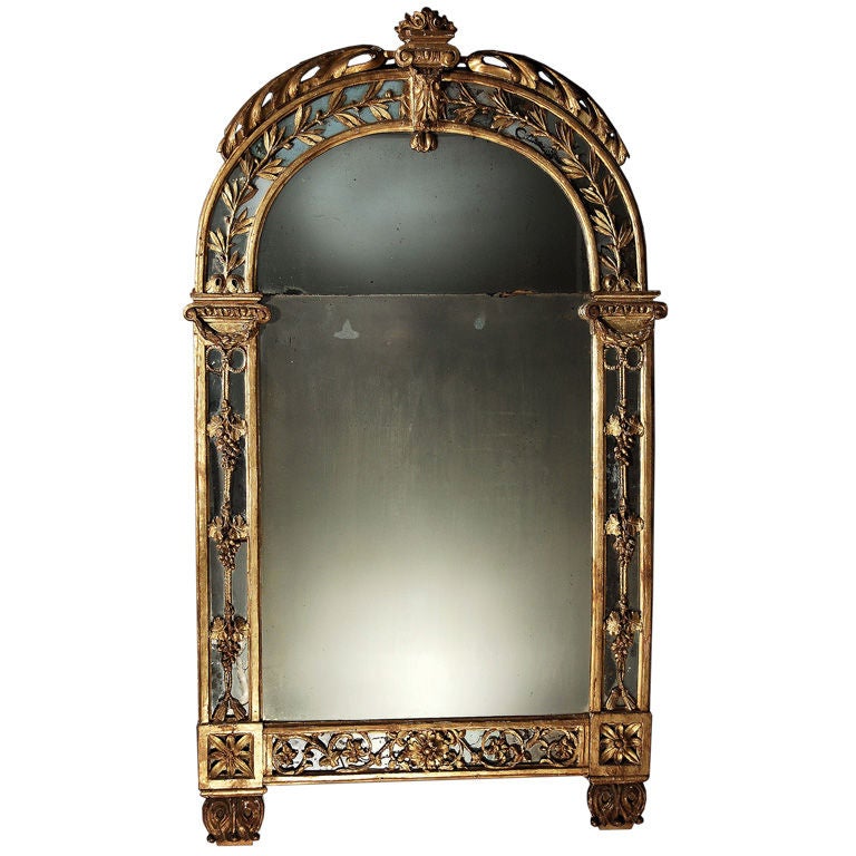 A Carved and Gilded mirror For Sale