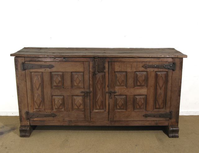 A Sun Bleached Two Door Credenza with Deep Molded Panel Decoration Wrought Iron Hardware on Sledge Feet. Spanish, Late18th Early 19th Century. Catalan