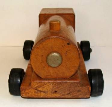 Whoo hoo!  A four-car train hand-crafted by the famed Community Playthings, a craft collective located in Rifton, New York.<br />
Founded in 1947, they were known for superior, high-quality toys of high play value.<br />
<br />
Item located in