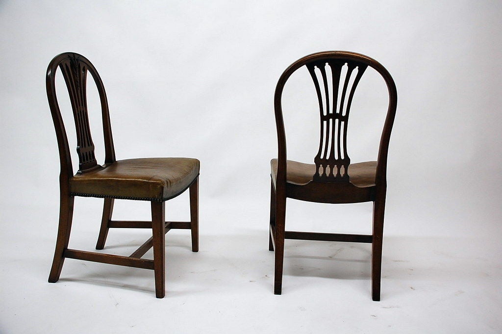 Pair of signed wide leather chairs by Maison Jansen - stamped