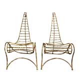 Pair of sculptural spine chairs in the style of André Dubreuil