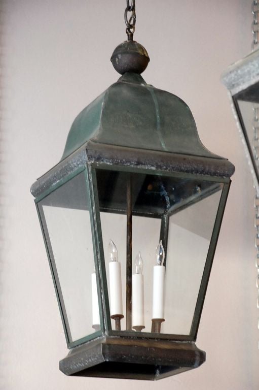 Pair of patinated bronze lanterns