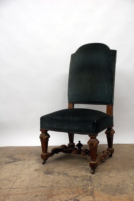 Pair of large sculpted and partially gilt Louis XIV style chairs
