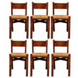 Set of 6 oak and rush chairs by Charlotte Perriand