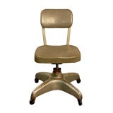 Machine age swiveling industrial chair