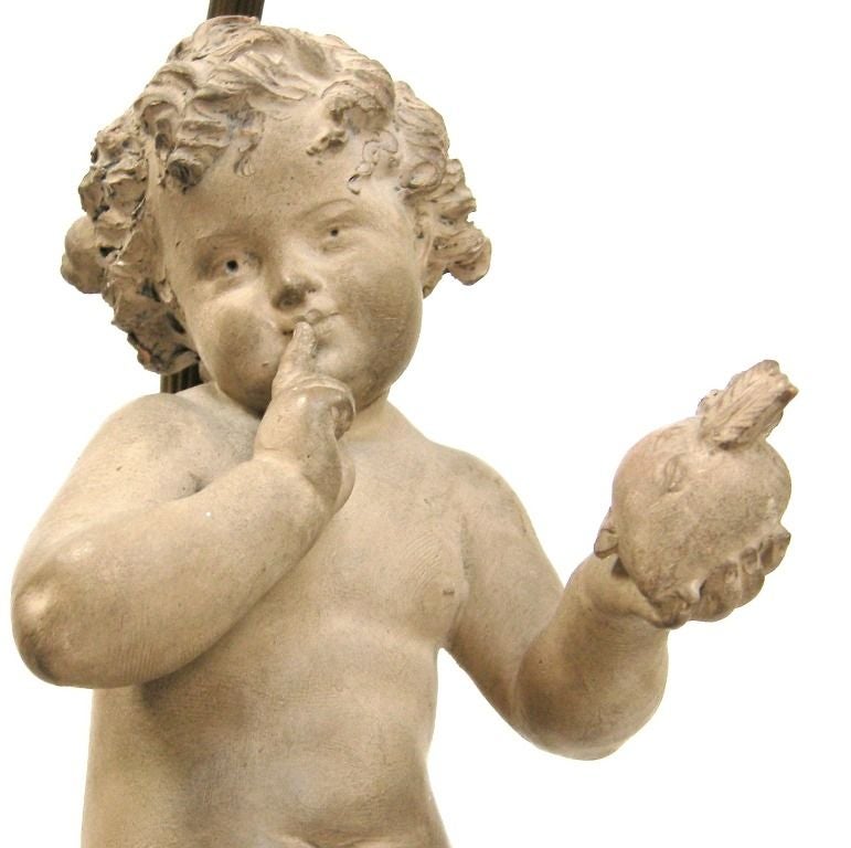 19th Century French Bonze Mounted Lamp with Terra Cotta Figure of Putti/Possibly Cupid - Signed 'L.Gregoire' (Jean Louis Gregoire 1840-1890).  Note: Figure is 5 Diameter by 11.5 High, Overall Lamp base is 7D x 20High, Shade shown for display only,