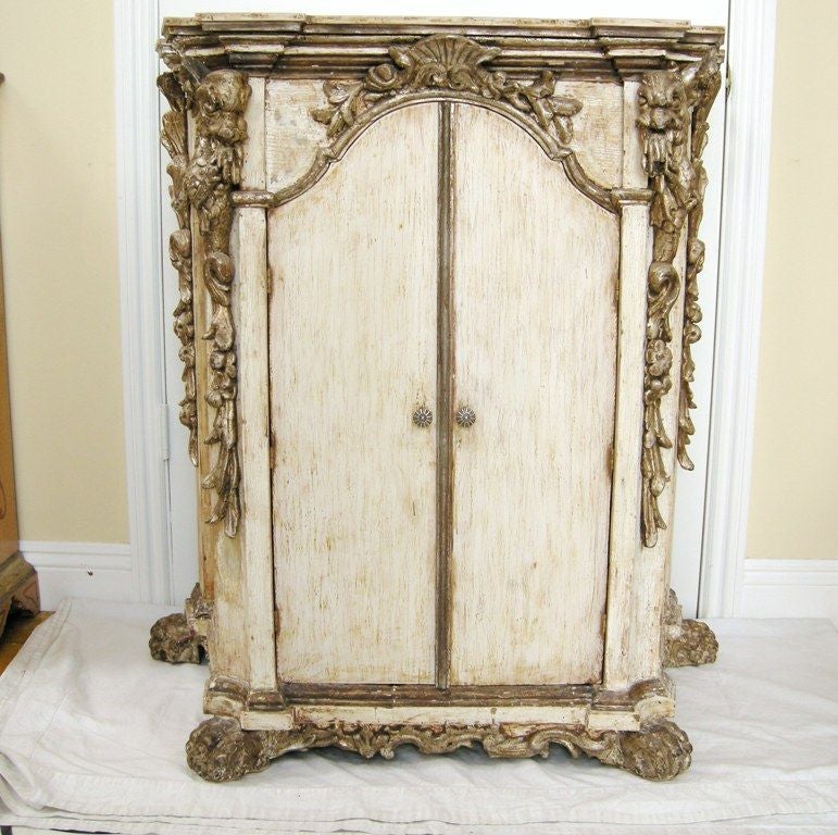 (Now on sale for 2,400.00, reduced from 4,800.00)
17th Century Venetian Baroque Carved, Painted & Silver Giltwood Reliquery, Made into Two-Door Cabinet w/Internal Shelf (pulls vintage/not original to piece/but in style of).