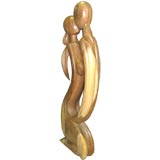 WOOD SCULPTURE OF A COUPLE KISSING