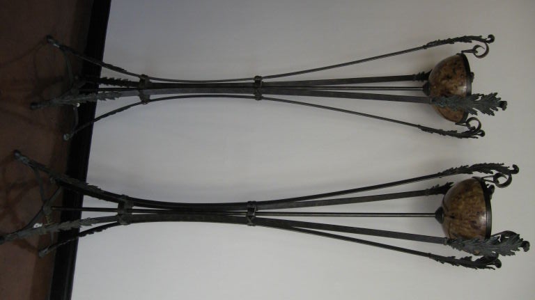 PAIR OF IRON AND BRONZE TORCHIERES