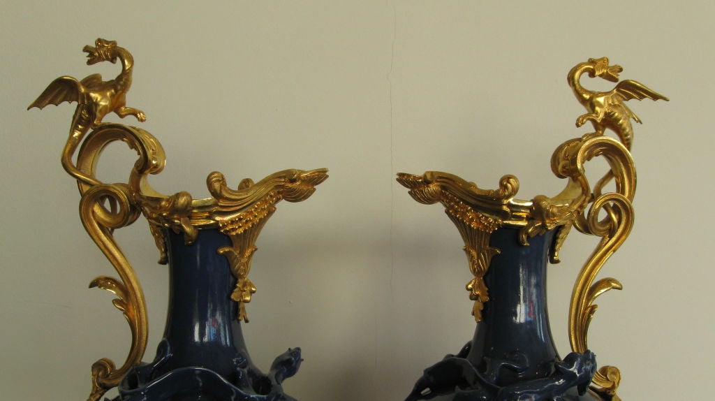 French PAIR OF FRENCH GILT-BRONZE AND PORCELAIN VASES