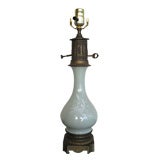 CELADON PORCELAIN AND BRONZE OIL LAMP