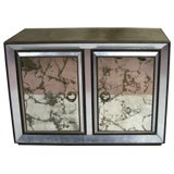 Vintage GOLD AND SILVER LEAF GLASS COMMODE.