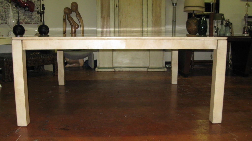 GOAT SKIN AND BRASS DINING TABLE BY KARL SPRINGER