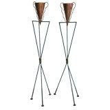 PAIR OF IRON AND COPPER TRIPOD TORCHIERES