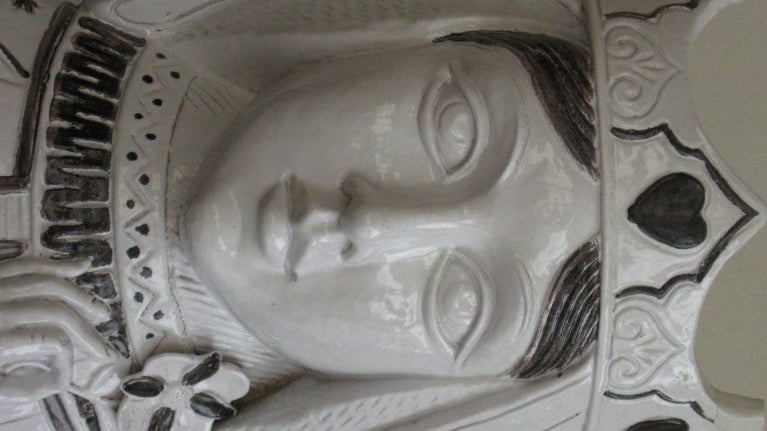 PAIR OF ITALIAN GLAZED TERRACOTA BUST PLANTERS