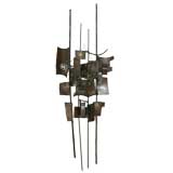 Iron and brass abstract wall sculpture