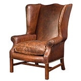 One Pair Of Distressed Leather Wing Back Chairs