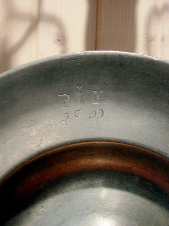 17th century pewter charger with hallmarks.
