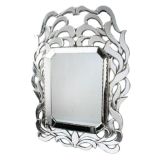 A Venetian Glass Mirror of Unusual Form