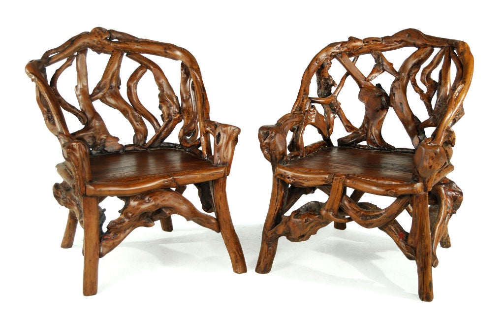 Pair of petite pieced-rootwood chairs in the Adirondack style from Northern China.<br />
<br />
Pagoda Red Collection #:  W026<br />
<br />
<br />
Keywords:  Chair, armchair, lounge, club, seating