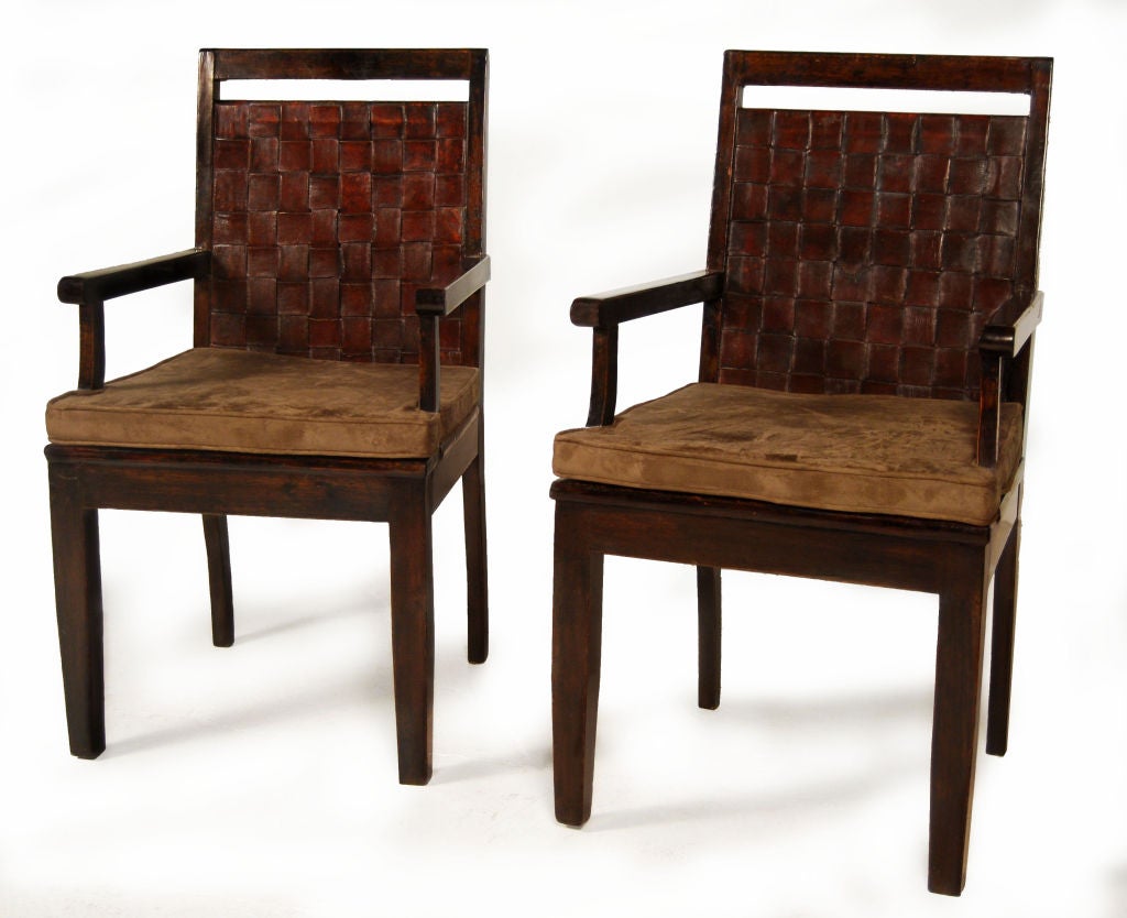 Pair of early 20th century teak wood chairs with woven leather backs and tobacco colored microsuede uphostered cushion from Shanghai, China.

Pagoda Red Collection #:  CAE130


Keywords:  Seating, chair, armchair, desk chair