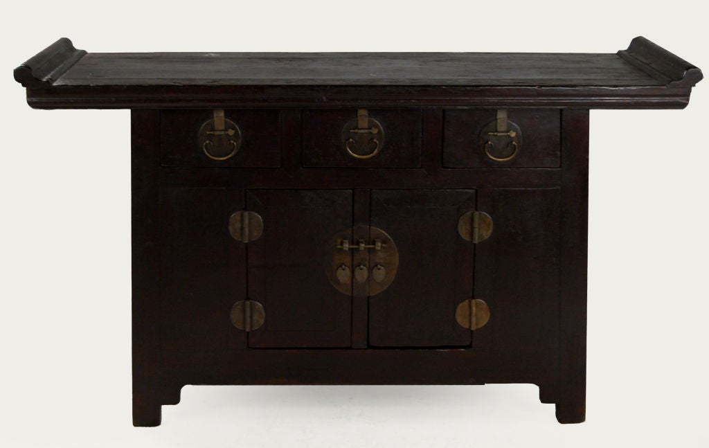 19th century Chinese altar cabinet with flanked top panel, three locking drawers, and two doors with brass hardware.<br />
<br />
Pagoda Red Collection #:  DVB008<br />
<br />
<br />
Keywords:  Console, sideboard, buffet, chest of drawers,