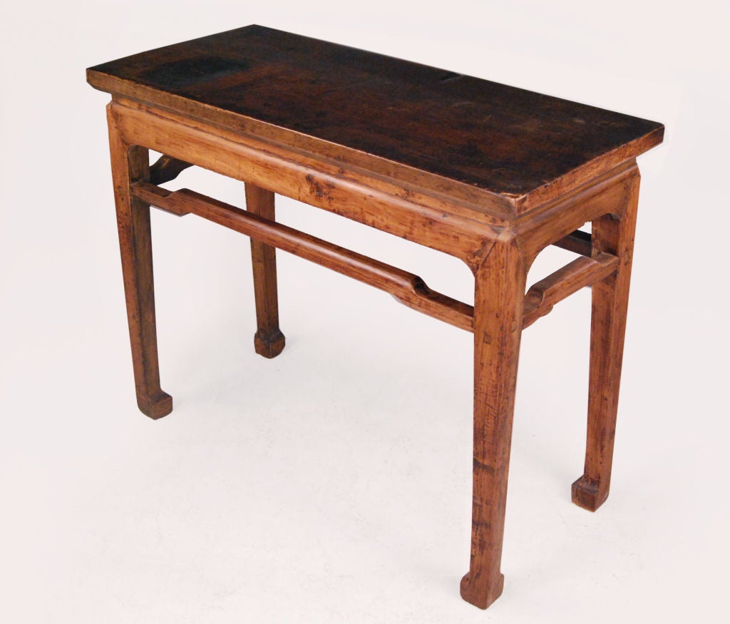 A 19th century Mongolian natural finished pear wood wine table with humpback stretchers, and horse hoof feet.<br />
<br />
Pagoda Red Collection #:  S027<br />
<br />
<br />
Keywords:  Table, side table, console, entry, end, bedside, night stand
