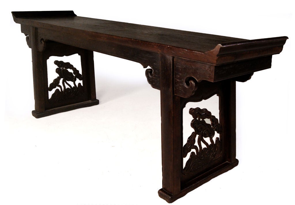 A Ming Dynasty ironwood flanked altar table with sides carved with a grouping of lingzhi (auspicious mushrooms) and spandrels carved with cloud motifs.

Pagoda Red Collection #:  ACA020

Keywords:  Table, console, sofa table, sideboard, buffet,
