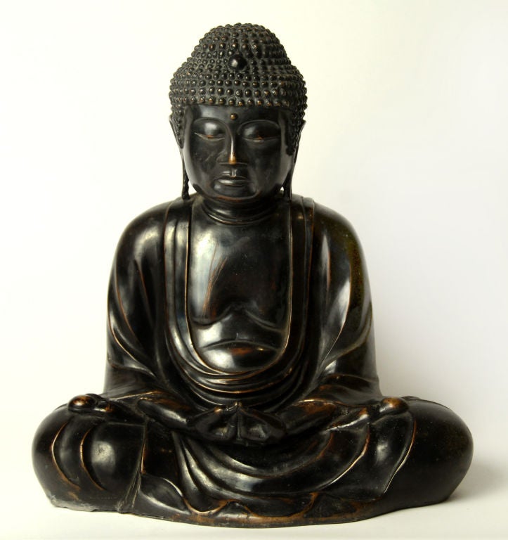 A 19th century Japanese bronze seated figure of Amida in dhyana mudra with heavy drapery folds. <br />
<br />
Pagoda Red Collection #:  PHB006<br />
<br />
<br />
Keywords:  Statue, sculpture, buddha, japan, japanese, buddhist, decorative object