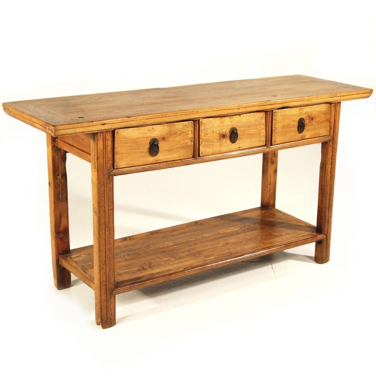 An early 20th century cypress altar table with three drawers and a shelf.<br />
<br />
Pagoda Red Collection #:  X022<br />
<br />
<br />
Keywords:  Table, console, sideboard, buffet, server, credenza, kitchen island