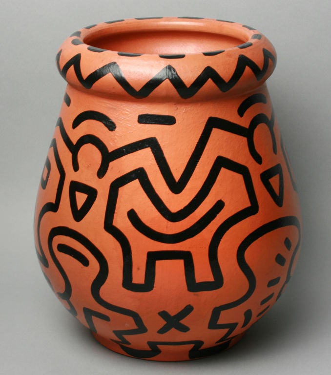 This is a fabulous and rare example of Keith Haring's work with ceramics