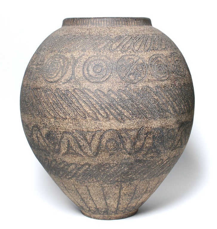 This is a fabulous unglazed stoneware vase by Karl Martz. Quite handsome, it measures 20.75
