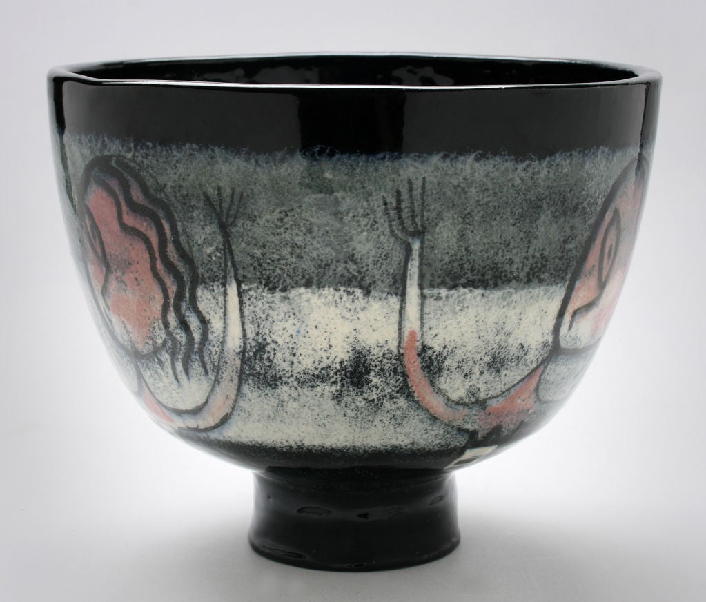 This is an early Pollia Pillin piece with the black glazed bottom that was done in Chicago.  Measuring 6.