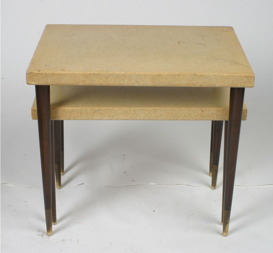 Paul Frankl cork top tables with tapered mahogany legs ending in brass sabots

Large 24
