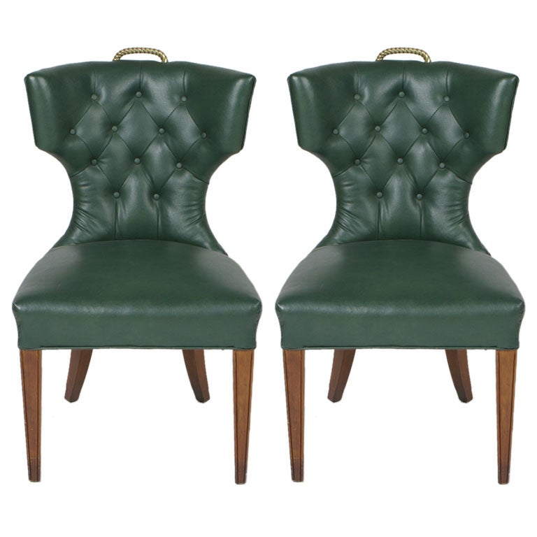 Pair of 1940
s tufted side chairs with brass rope handles