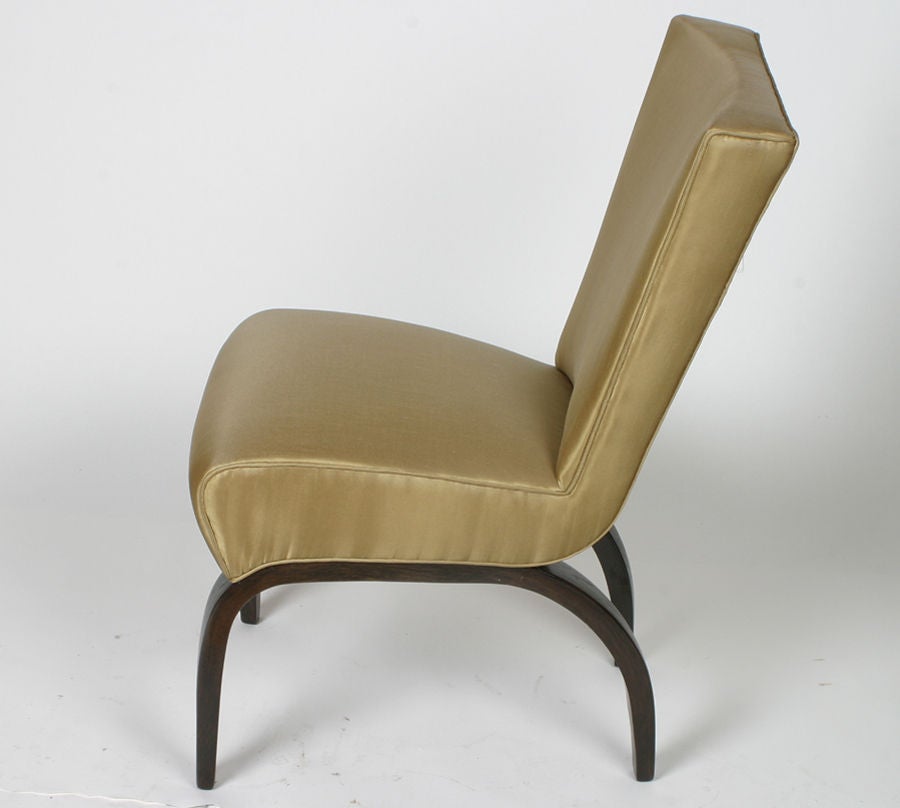 Slipper chair by Thonet with bentwood oak legs in dark brown finish.