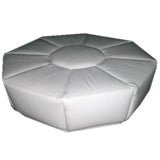 1970's round about upholstered in white patent leather