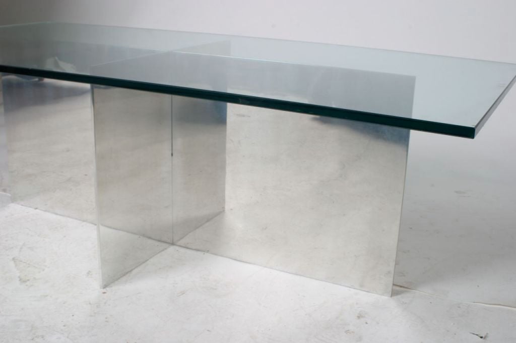 Stainless steel base  in cross formation with rectangular glass top. Base is 36