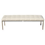 International style chrome bench with tufted leather seat